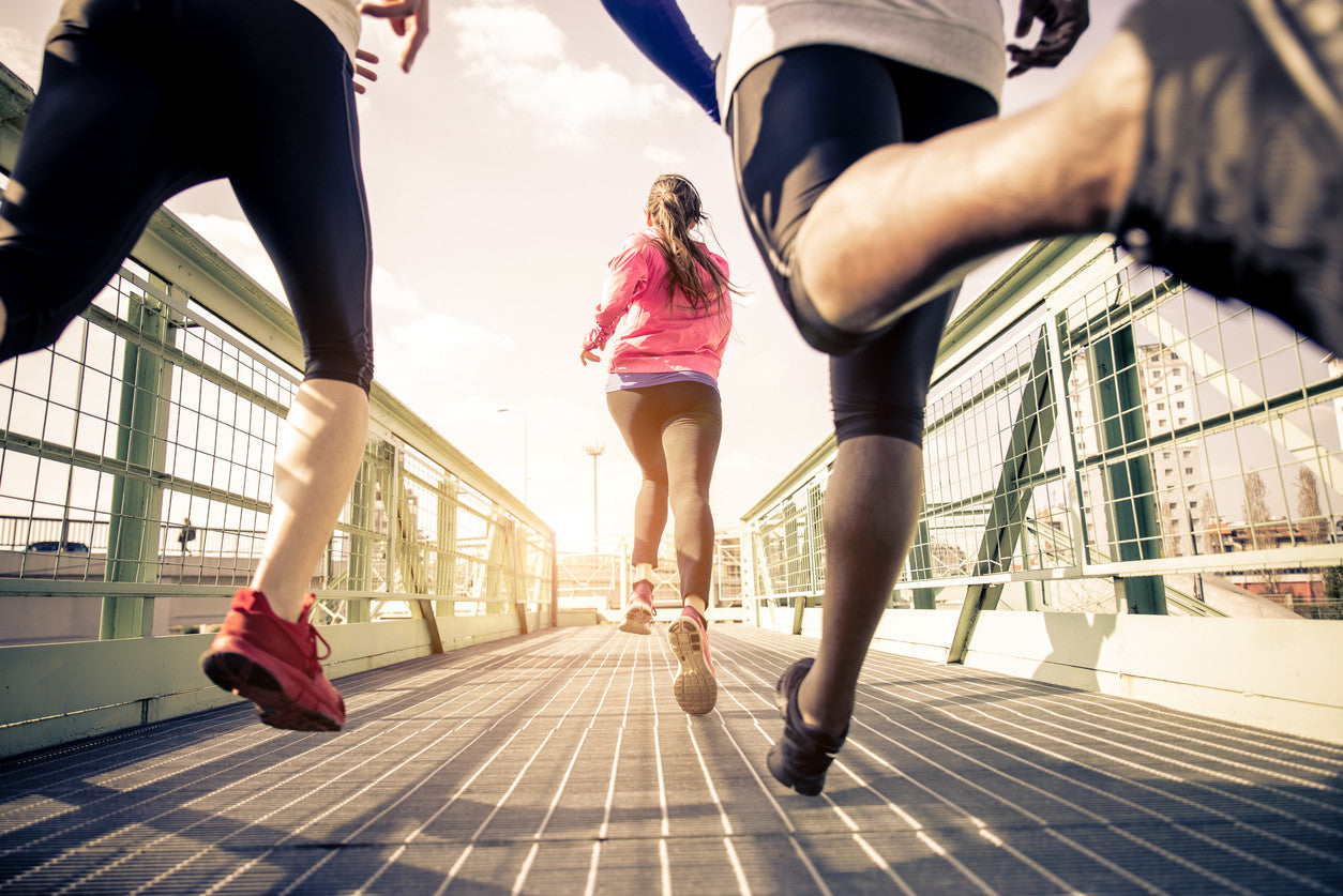 Girl running on indoor track