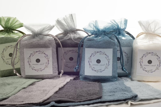 An image of Courage & Grace Body Care's six available colors of organic bamboo washcloths for sensitive skin.